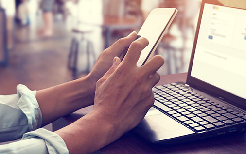 Hands and a laptop