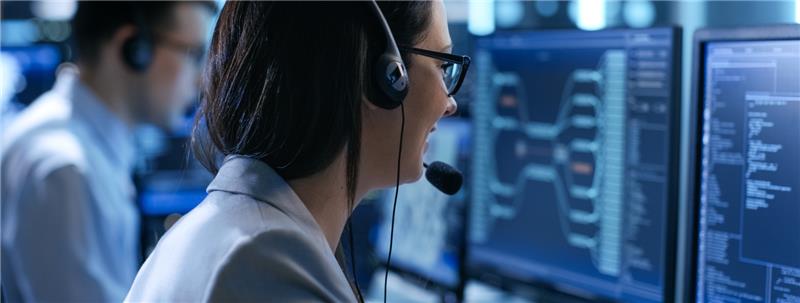 Woman working in system control center